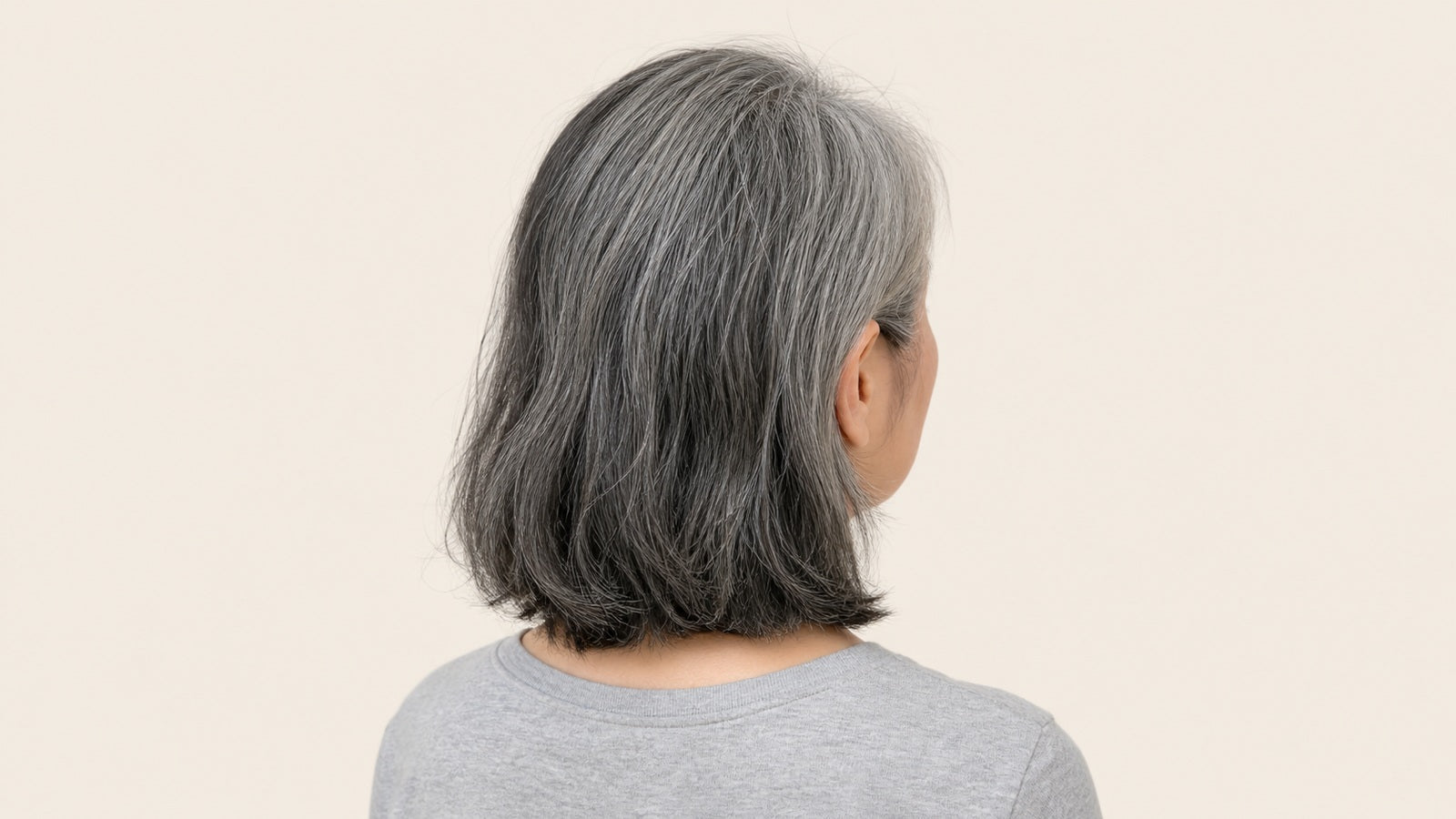 Gray hair before coloring and natural black hair after coloring