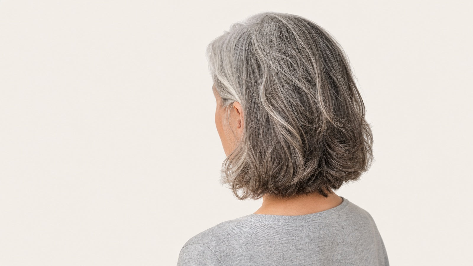 Gray hair before coloring and natural dark brown hair after coloring